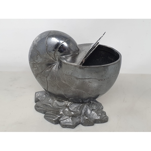 53 - A white metal Nautilus Shell Spoon Warmer. (R1)