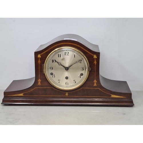 56 - A 20th Century Mantle Clock with circular silvered dial, three train striking and chiming movement, ... 