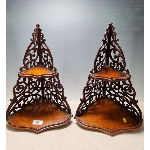 651 - A pair of mahogany carved and pierced Corner Wall Brackets/Shelves, with scrolled designs, A/F, 1ft ... 