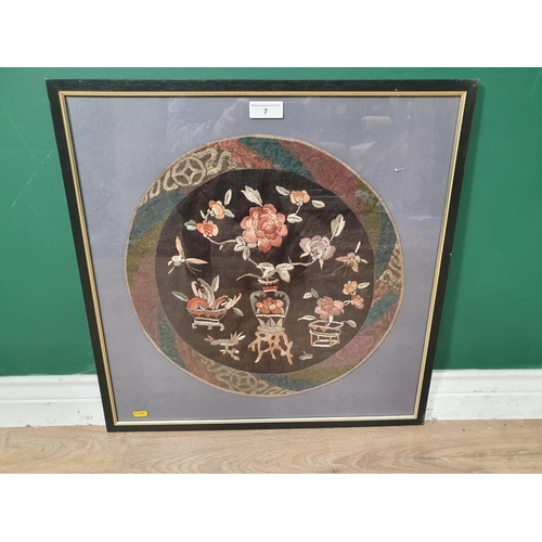 7 - A Chinese needlework circular Panel depicting vase of flowers, 17in, framed and glazed (R2)