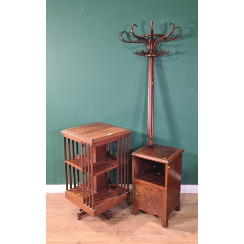 702 - A mahogany Revolving Bookcase, 34