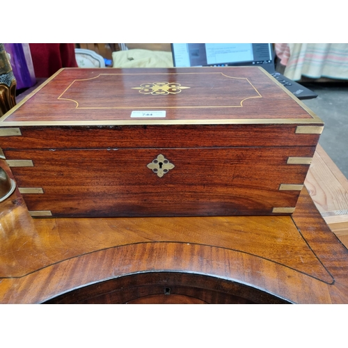 744 - A 19th Century Anglo-Indian brass bound Storage Box with multiple interior compartments mounted with... 