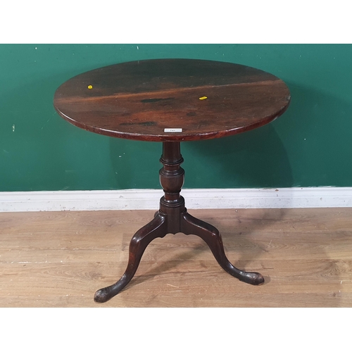 747 - A 19th Century mahogany tilt-top Table with turned column and tripod base, 2ft 6in diam, (R9)