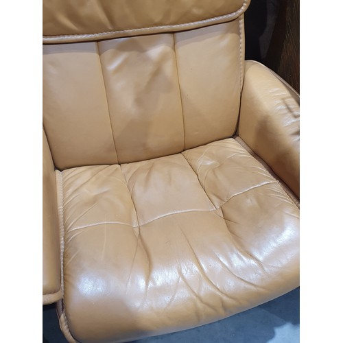 2 - A beige upholstered Armchair and matching Footstool. (R7).