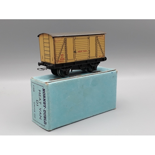 1011 - A boxed pre-war Hornby Dublo D1 S.R. Meat Van, Nr M slight staining to roof on each end, no fatigue ... 