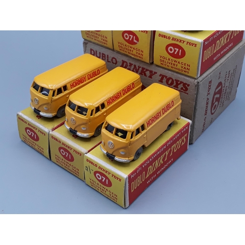 1042 - A Dublo Dinky Toys Trade Box of 6x 071 Volkswagen Delivery Vans, three with black wheels and three w... 