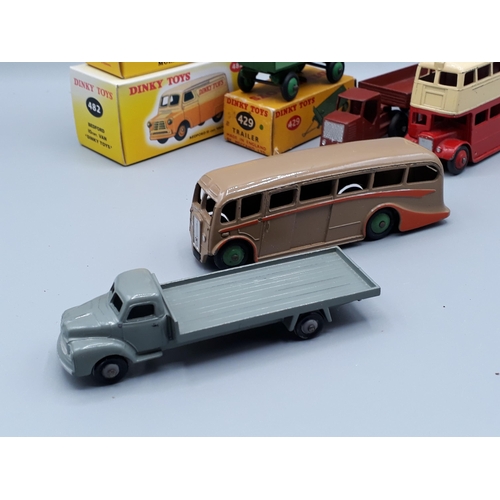 1184 - A Dinky Toys No.29C Double Deck Bus, a Luxury Coach, two boxed Atlas Dinky Toys Nr M and a Dublo Din... 