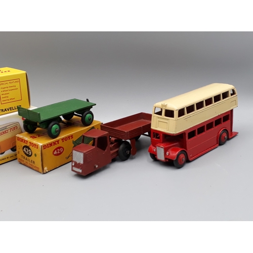 1184 - A Dinky Toys No.29C Double Deck Bus, a Luxury Coach, two boxed Atlas Dinky Toys Nr M and a Dublo Din... 