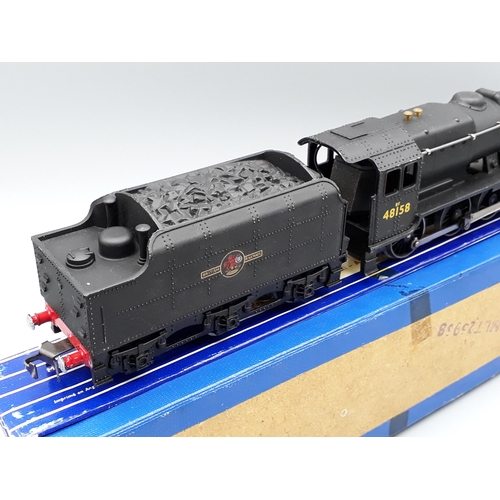 1186 - A boxed Hornby Dublo LT25 8F 2-8-0 Locomotive in striped box. The locomotive appears unused with no ... 