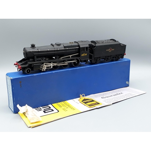 1187 - A boxed Hornby Dublo LT25 8F 2-8-0 Locomotive in scarcer plain blue box. Locomotive Nr M-M, box Ex-N... 