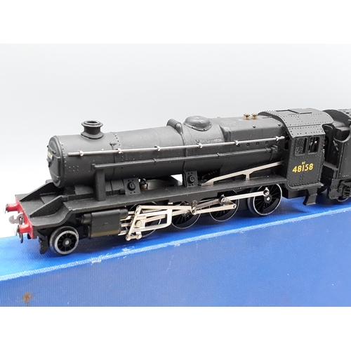 1187 - A boxed Hornby Dublo LT25 8F 2-8-0 Locomotive in scarcer plain blue box. Locomotive Nr M-M, box Ex-N... 