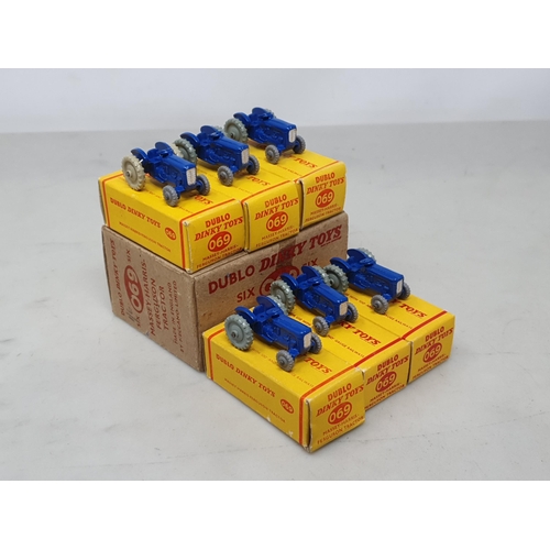 1188 - A Dublo Dinky Toys Trade Box containing six boxed 069 Massey-Harris Ferguson Tractors, M, boxes Ex p... 