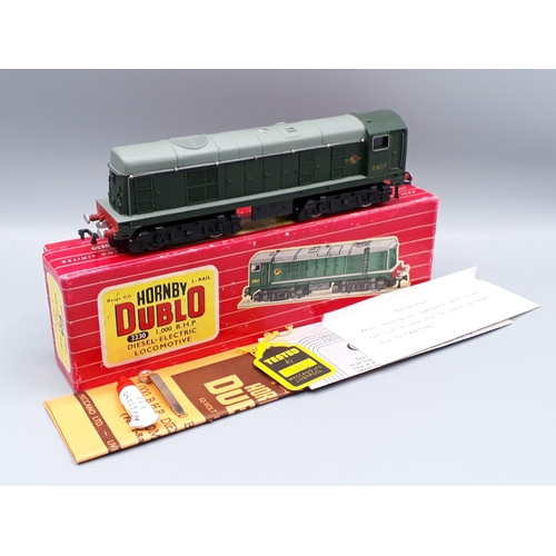 1211 - A boxed Hornby Dublo 2230 Bo-Bo diesel Locomotive in striped picture box, M, appears unused with no ... 