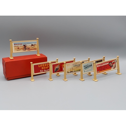 1215 - A boxed Hornby 42381 Box of six Station Hoardings in lighter red box, Ex plus- Nr M, box Nr M