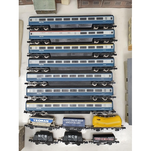 1223 - Seven unboxed Graham Farish N gauge Intercity Coaches, six Wagons and a quantity of Buildings