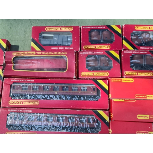 1242 - A box of boxed Hornby 00 gauge Coaches and Wagons including LMS Composite Coaches, BR Composite Coac... 