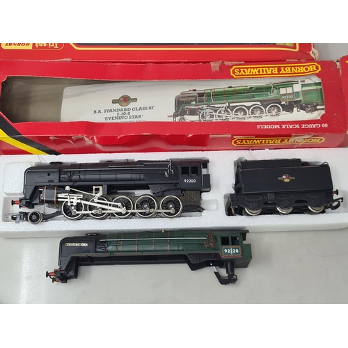 1245 - A boxed Hornby 00 gauge R065 9F 'Evening Star' in BR black livery with spare locomotive and tender b... 