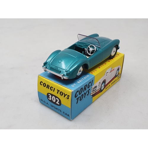 1522 - A boxed Corgi Toys No.302 metallic green M.G.A. Sports Car, M, box superb