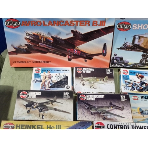 1655 - A box of Airfix and Matchbox Aircraft and Ship Kits and Figures including Heinkel He111, Short Stirl... 