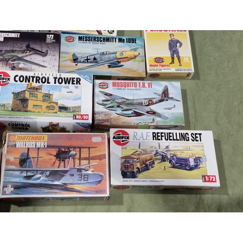 1655 - A box of Airfix and Matchbox Aircraft and Ship Kits and Figures including Heinkel He111, Short Stirl... 