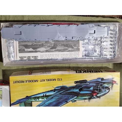 1655 - A box of Airfix and Matchbox Aircraft and Ship Kits and Figures including Heinkel He111, Short Stirl... 