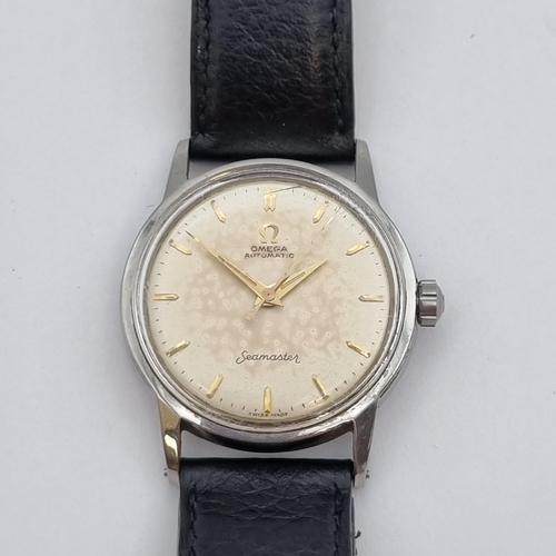 153 - A gentleman's Omega Seamaster Automatic Wristwatch the cream dial with hourly baton markers and swee... 