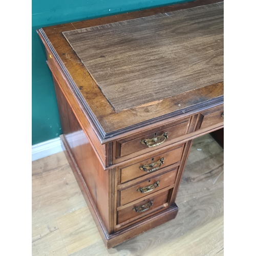 471 - A Pedestal Desk with nine fitted drawers raised on castors (lacking writing surface), 2ft 6