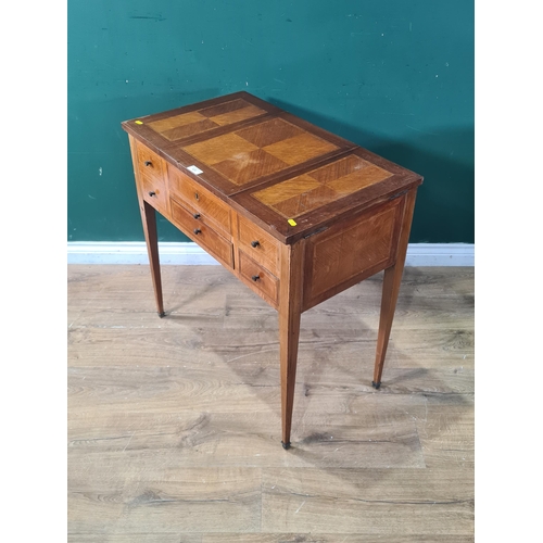 463 - A mahogany Dressing Table the top with three lift up lidded compartments one with a fitted mirror, a... 