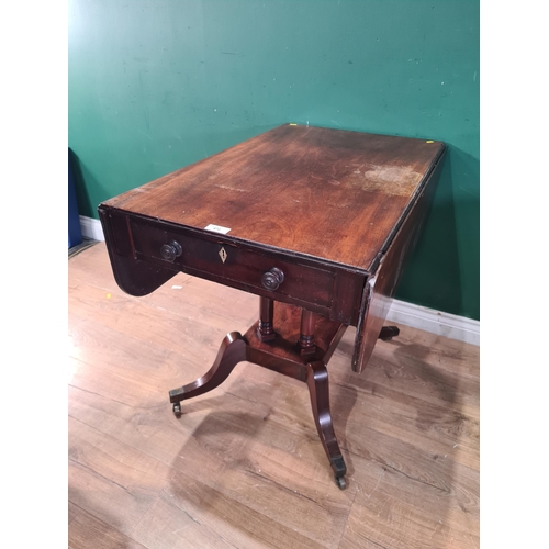 467 - A mahogany Sofa Table with single fitted drawer, raised on four turned columns and platform base wit... 