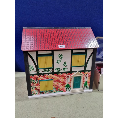 509 - A wooden Doll's House, a quantity of Doll's House Furniture and a child's Picnic Set (R2)