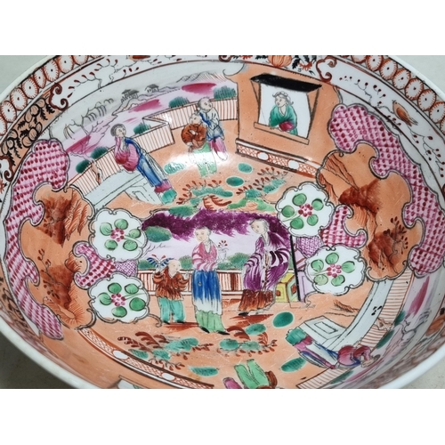 254 - A New Hall ceramic Bowl with all over famille rose pattern, figures within a landscape double border... 