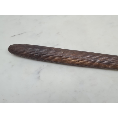 89 - An Aboriginal hardwood 'nula nula' Club with reeded and chip carving 2ft 2in L. (R2).