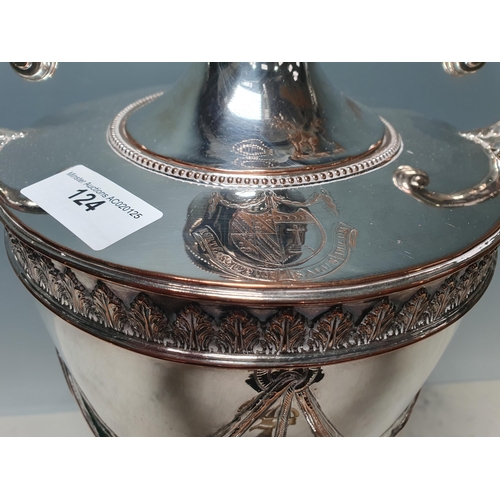 124 - A Sheffield plated Tea Urn with leafage and swag decoration, the cover engraved crest and motto, wit... 