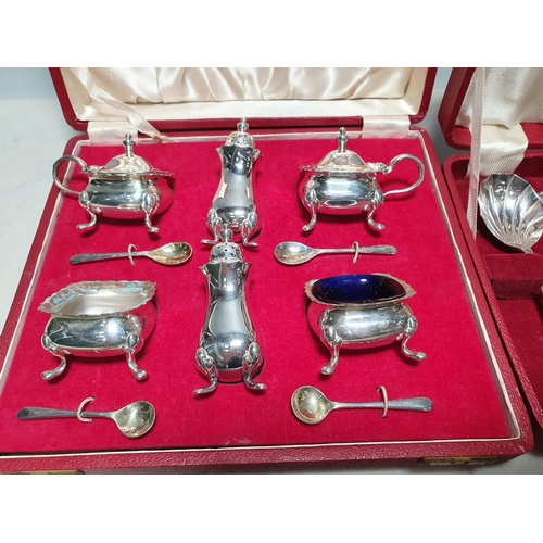 126 - A plated six piece Condiment Set, and a Set of plated Spoons, both cased