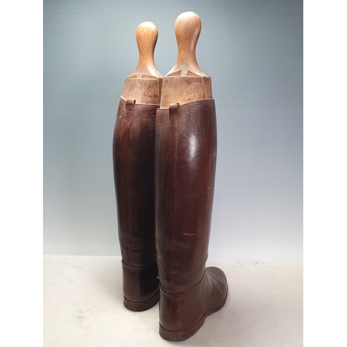 13 - A pair of gentleman's brown leather Hunting Boots with wooden trees with Tom Hill, London label (R3)