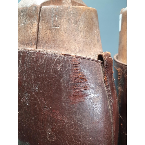 13 - A pair of gentleman's brown leather Hunting Boots with wooden trees with Tom Hill, London label (R3)