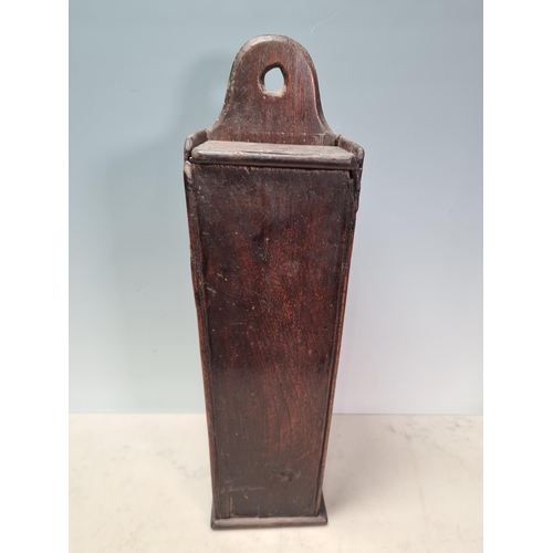 15 - An antique elm Candle Box with sliding cover and of tapering form, 1ft 5in H, (R5)