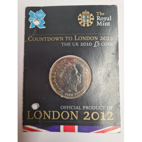 158 - A London 2012 Official 50p Sports Collection Album, complete except completer medal, along with a pa... 