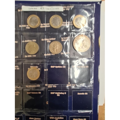 159 - A Collection of 50 pence pieces and two pound Coins, in change checker Album, to include a 2019 re-i... 