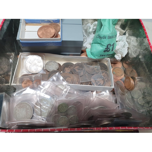 196 - A tin of British and World Coins to include 1935 Crown, a Palestine 1935 100 mils, a small quantity ... 