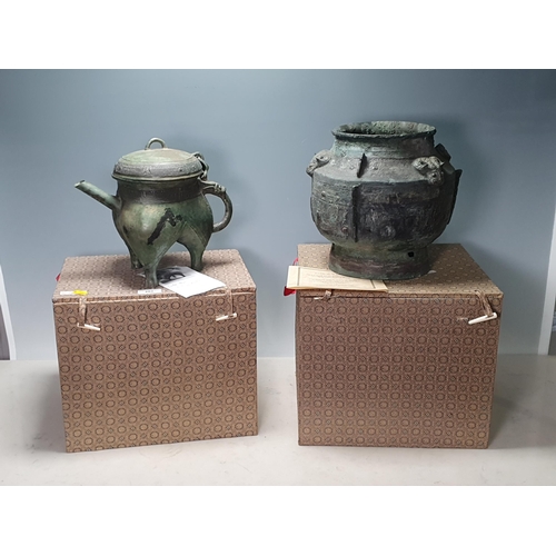 202 - Two replicas of original Ancient Bronze items in the collection of the Palace Museum, Beijing; a Zho... 