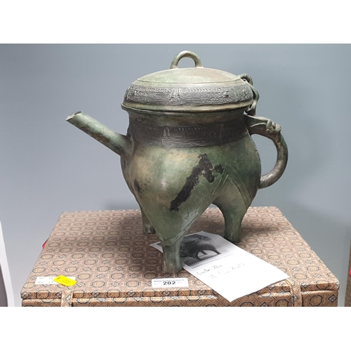 202 - Two replicas of original Ancient Bronze items in the collection of the Palace Museum, Beijing; a Zho... 