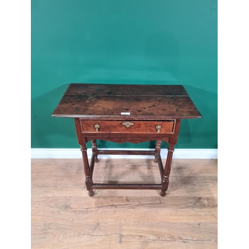 21 - An 18th Century oak Side Table fitted single drawer above shaped frieze on baluster turned and squar... 