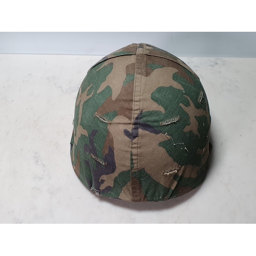 213 - A military steel Helmet (R10)