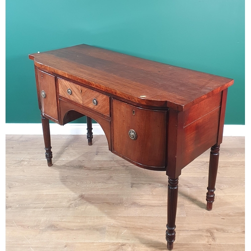 228 - A 19th Century mahogany small Sideboard, fitted three drawers and raised on turned tapering reeded s... 