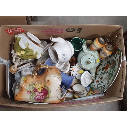 261 - Three boxes of china including teapots, jugs, plates, model of a windmill, etc, (R4)