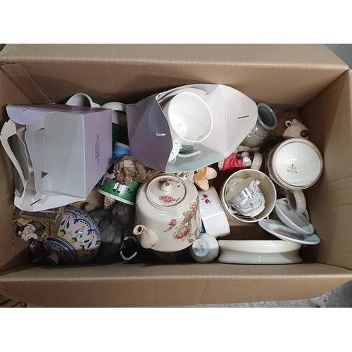 261 - Three boxes of china including teapots, jugs, plates, model of a windmill, etc, (R4)