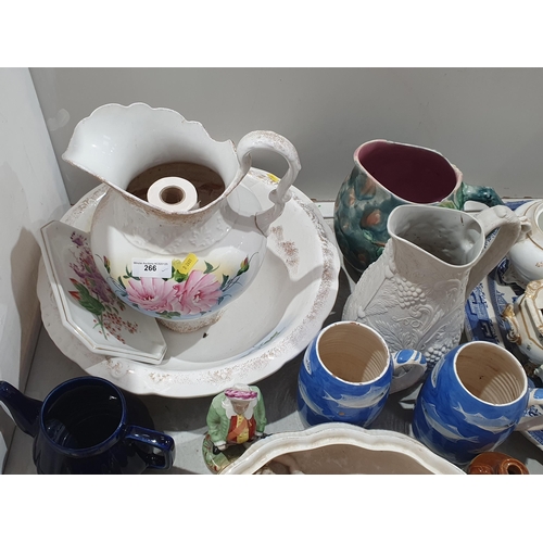 266 - A large quantity of china and pottery including 19th Century Sucriers, moulded pottery Jugs, a Toile... 