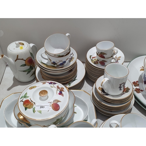 283 - A large quantity of Evesham pattern Royal Worcester oven to tableware including Tureens, Dishes, Cof... 