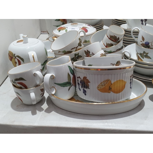 283 - A large quantity of Evesham pattern Royal Worcester oven to tableware including Tureens, Dishes, Cof... 